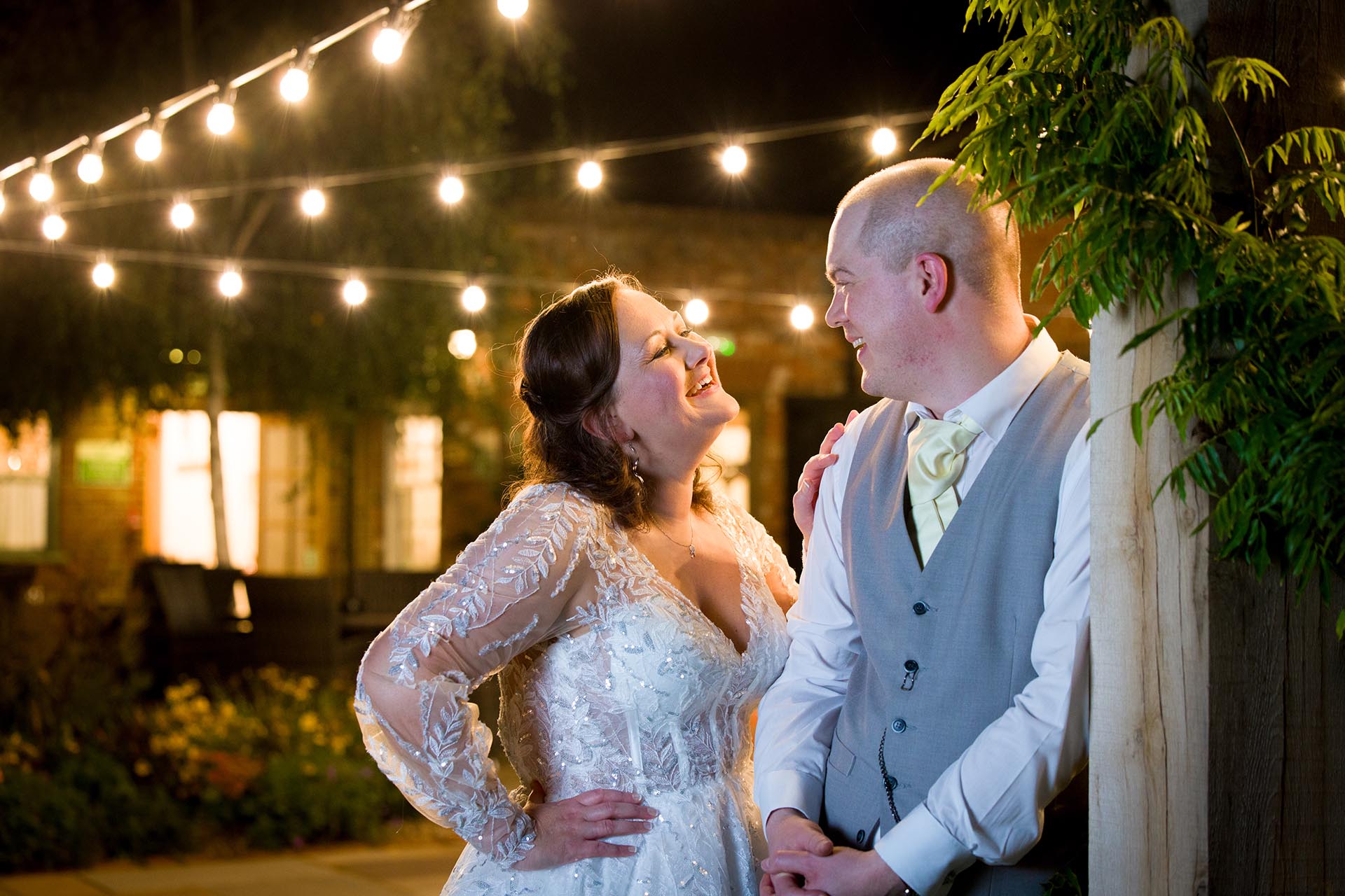Bride and groom photograph at night by Essex wedding photographer at Mulberry House High Ongar