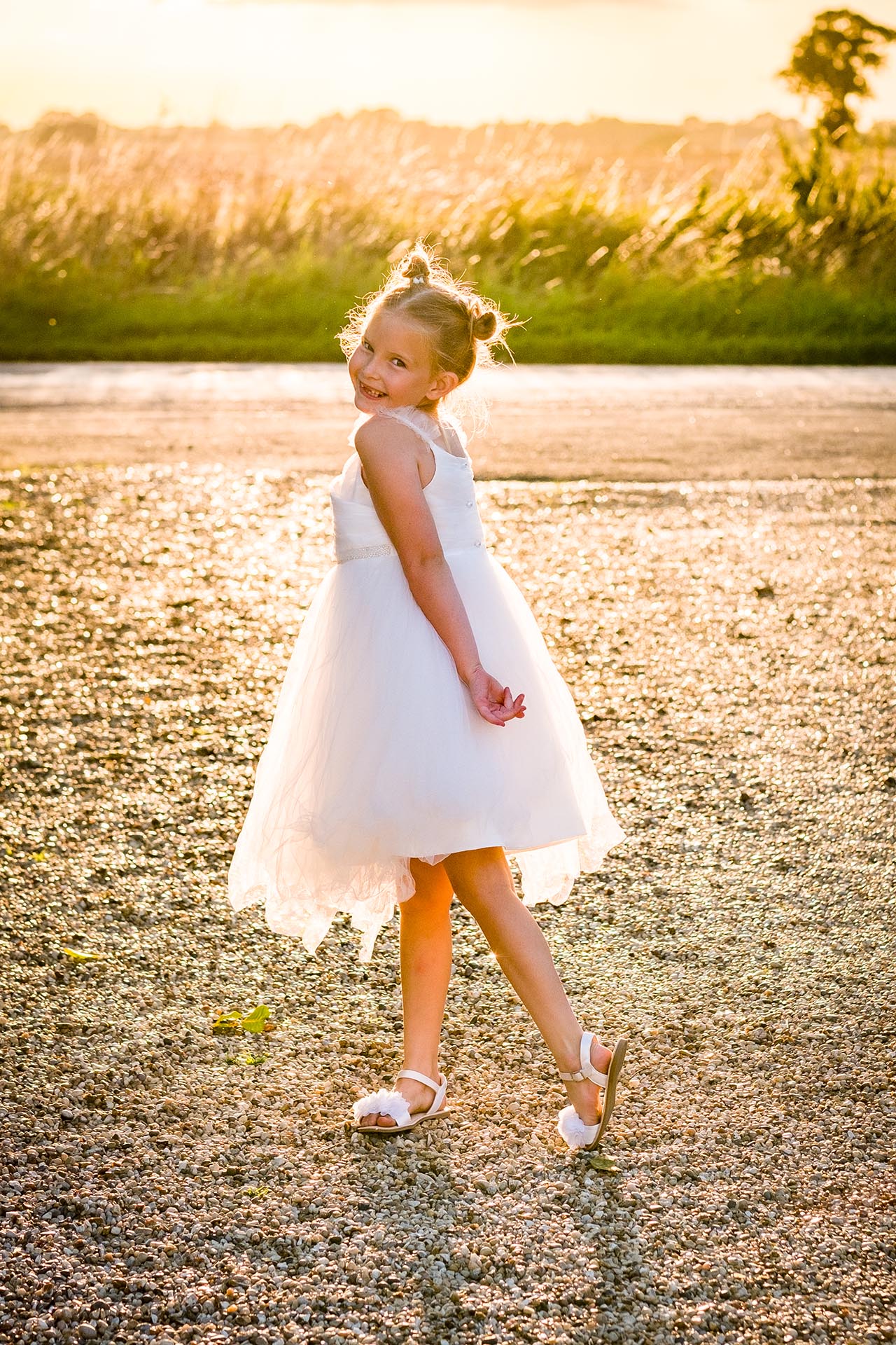 Golden light photograph by Essex wedding photographer at The Compasses at Pattiswick