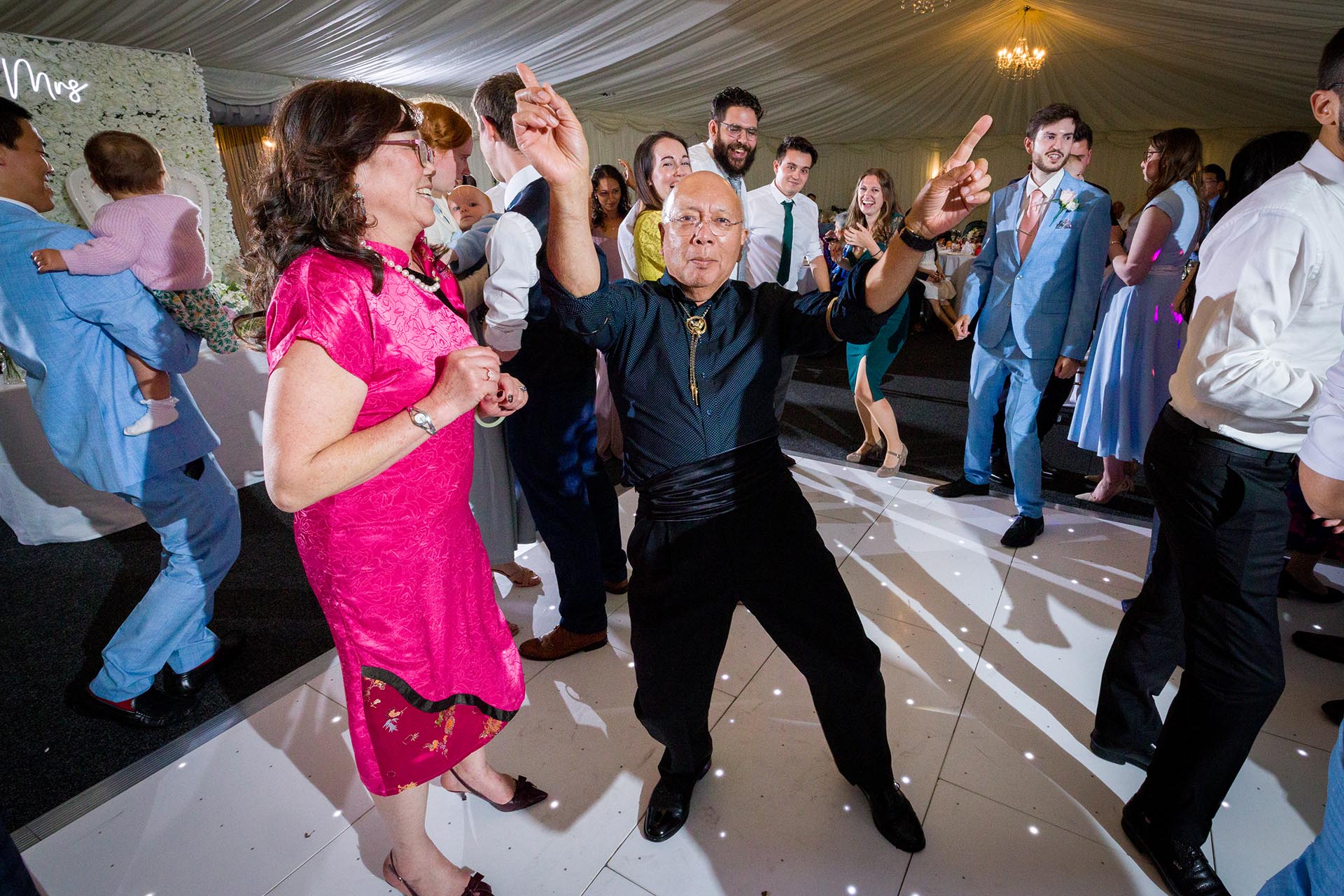 Dancefloor photograph by Essex documentary wedding photography at The Grand Marquee Brentwood
