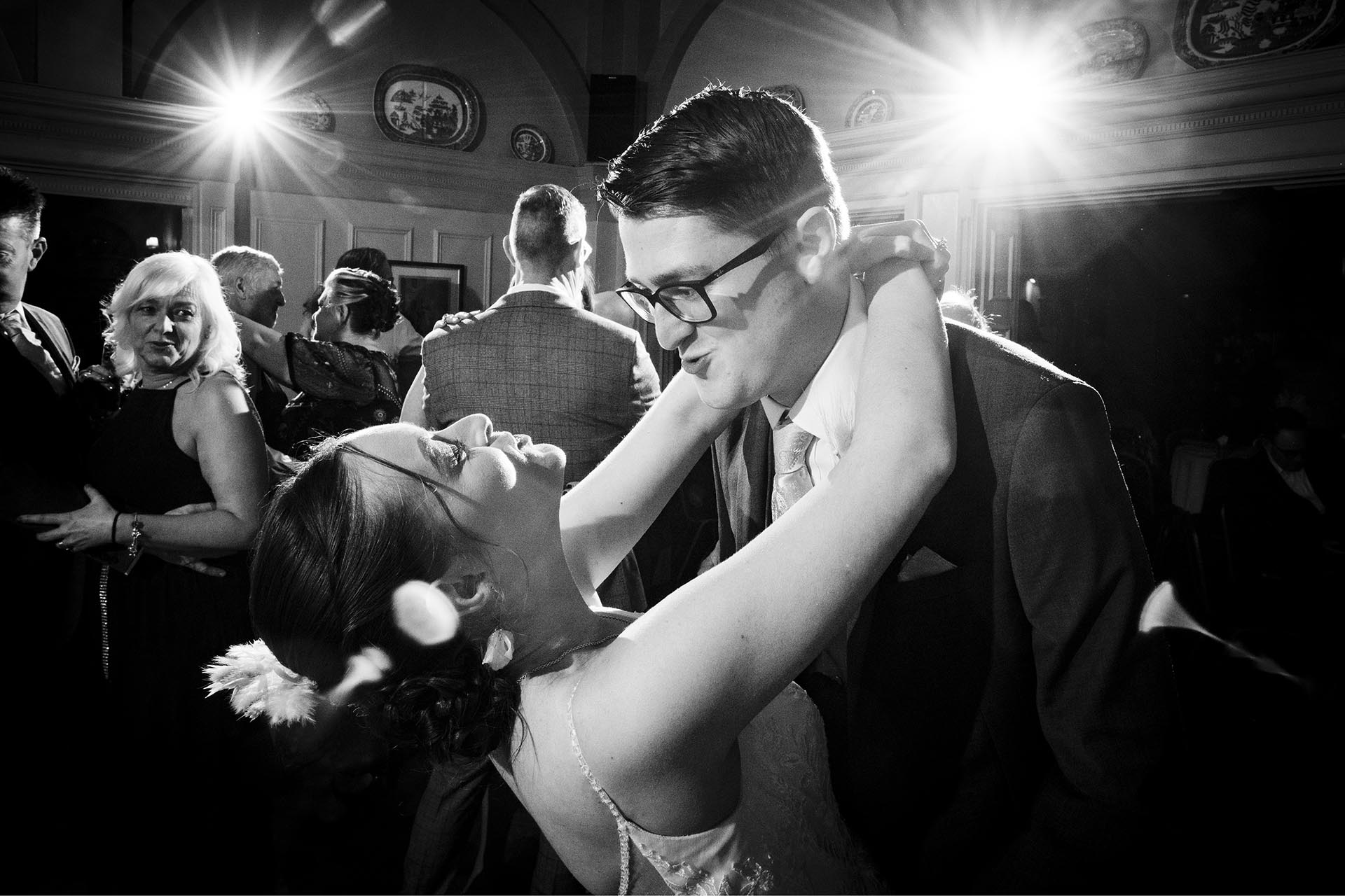Bride and groom dancing by Essex wedding photographer at The Lawn Rochford