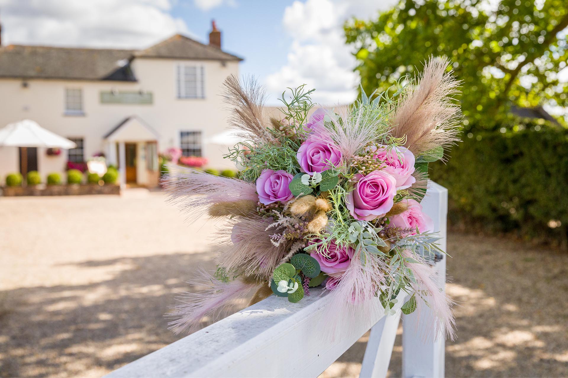 Bridal flowers by Essex wedding photographer at The Compasses at Pattiswick