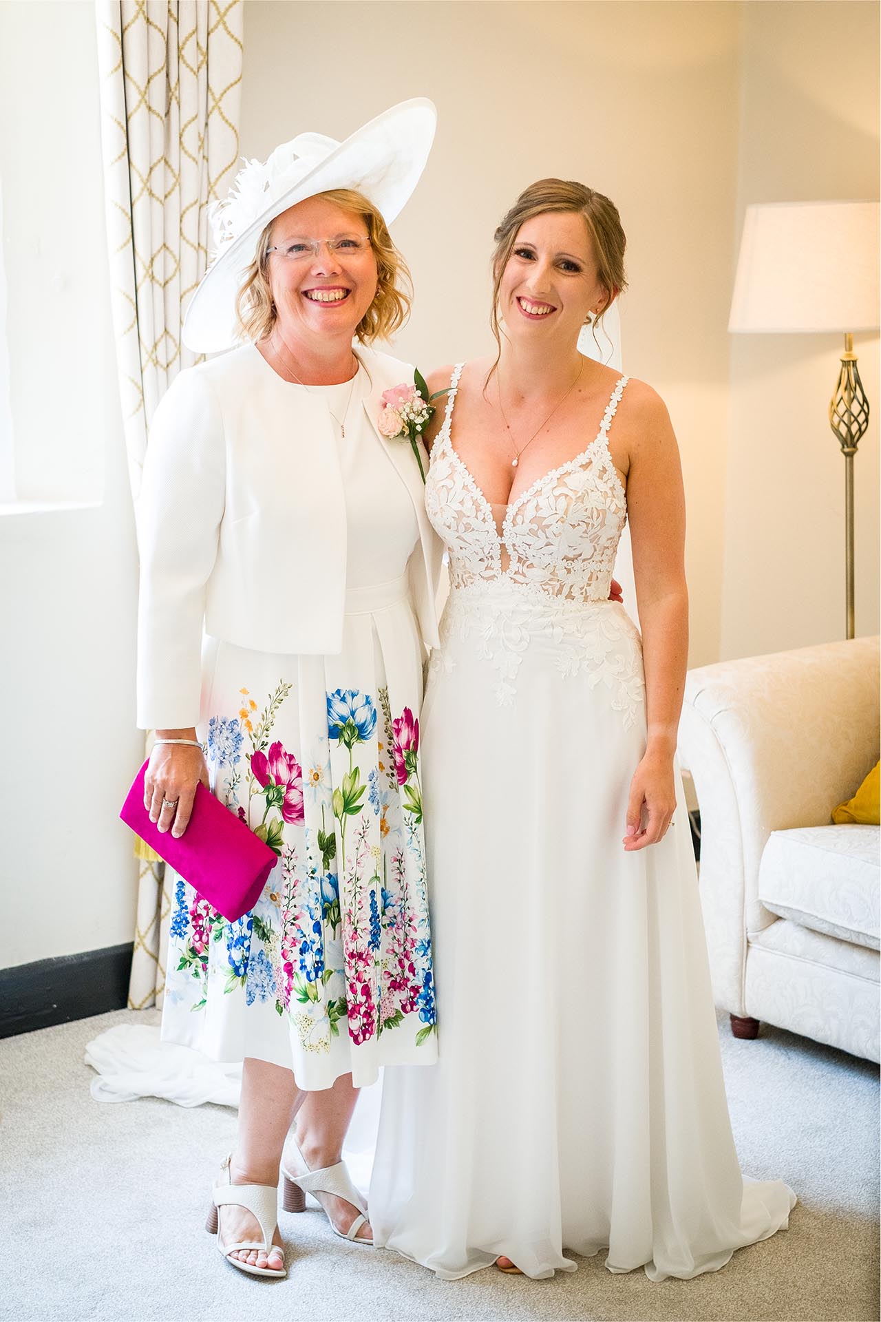 Bride and mother of the bride before the wedding ceremony at Leez Priory, Great Leighs, Chelmsford by Essex wedding photographer