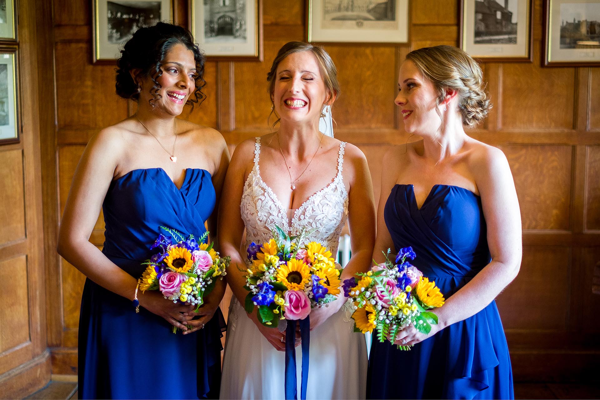 Bride and bridesmaids before the wedding ceremony at Leez Priory, Great Leighs, Chelmsford by Essex wedding photographer