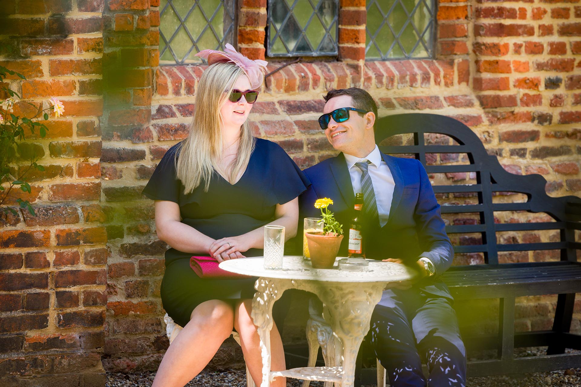Wedding guests enjoying the summer sunshine at Leez Priory, Great Leighs, Chelmsford