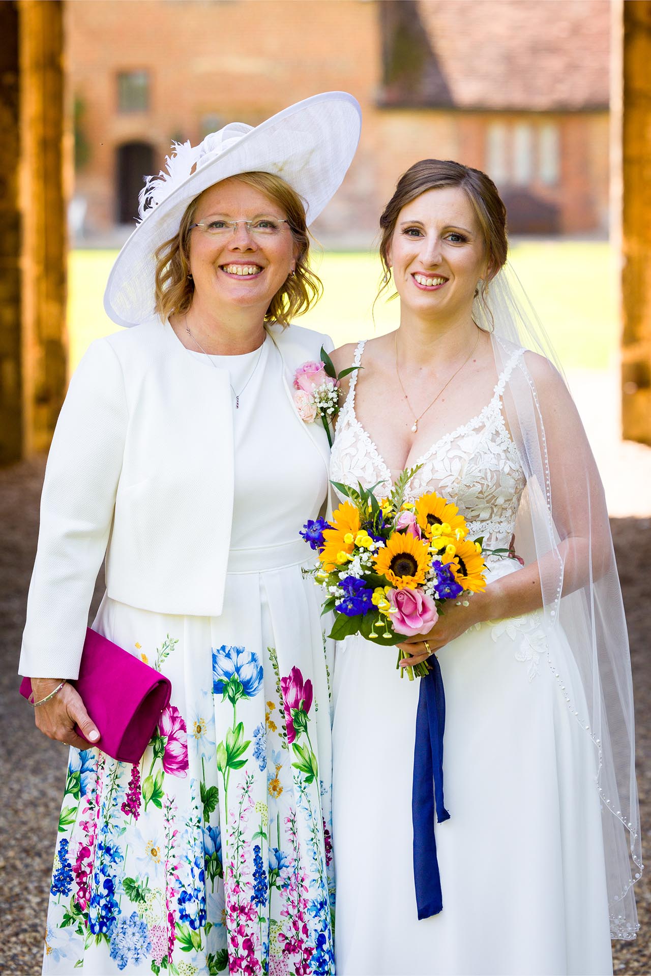 Bride and her mum at a summer Leez Priory wedding, Great Leighs, Chelmsford, by Essex wedding photographer
