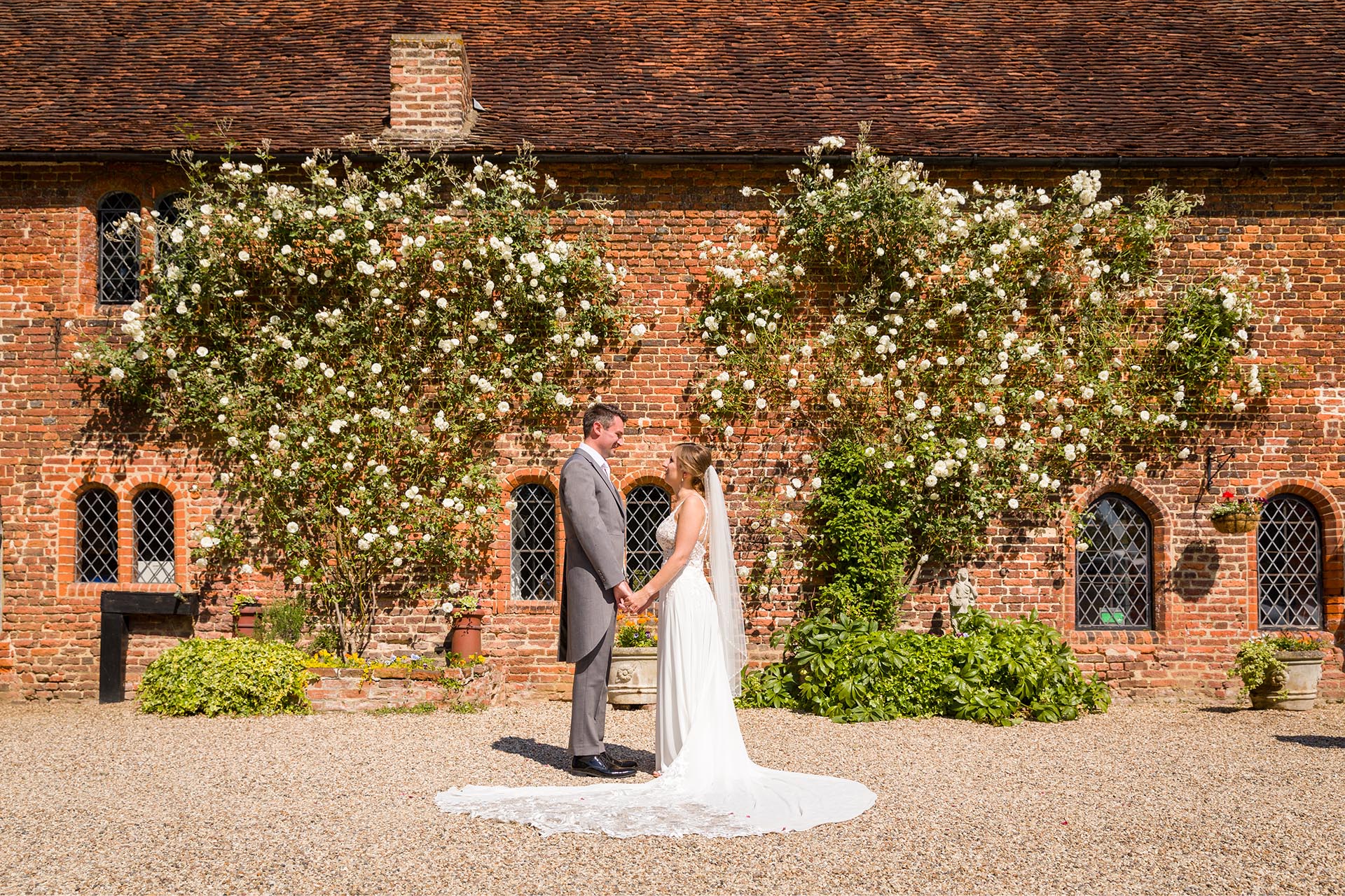 Bride and groom portrait during a summer wedding at Leez Priory, Great Leighs, Chelmsford, by Essex wedding photographer