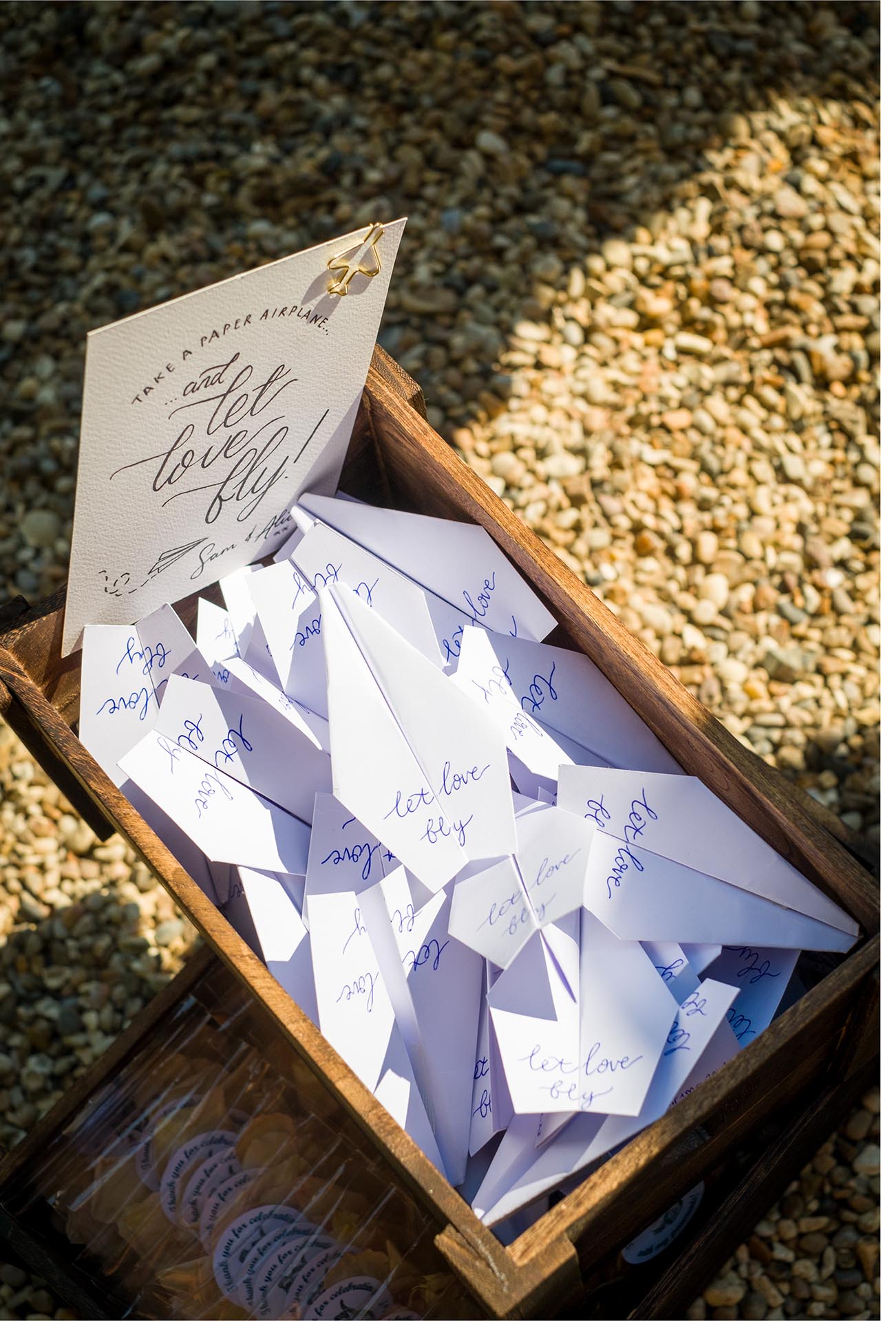 Paper aeroplanes for confetti at a Leez Priory wedding, Great Leighs, Chelmsford, by Essex wedding photographer