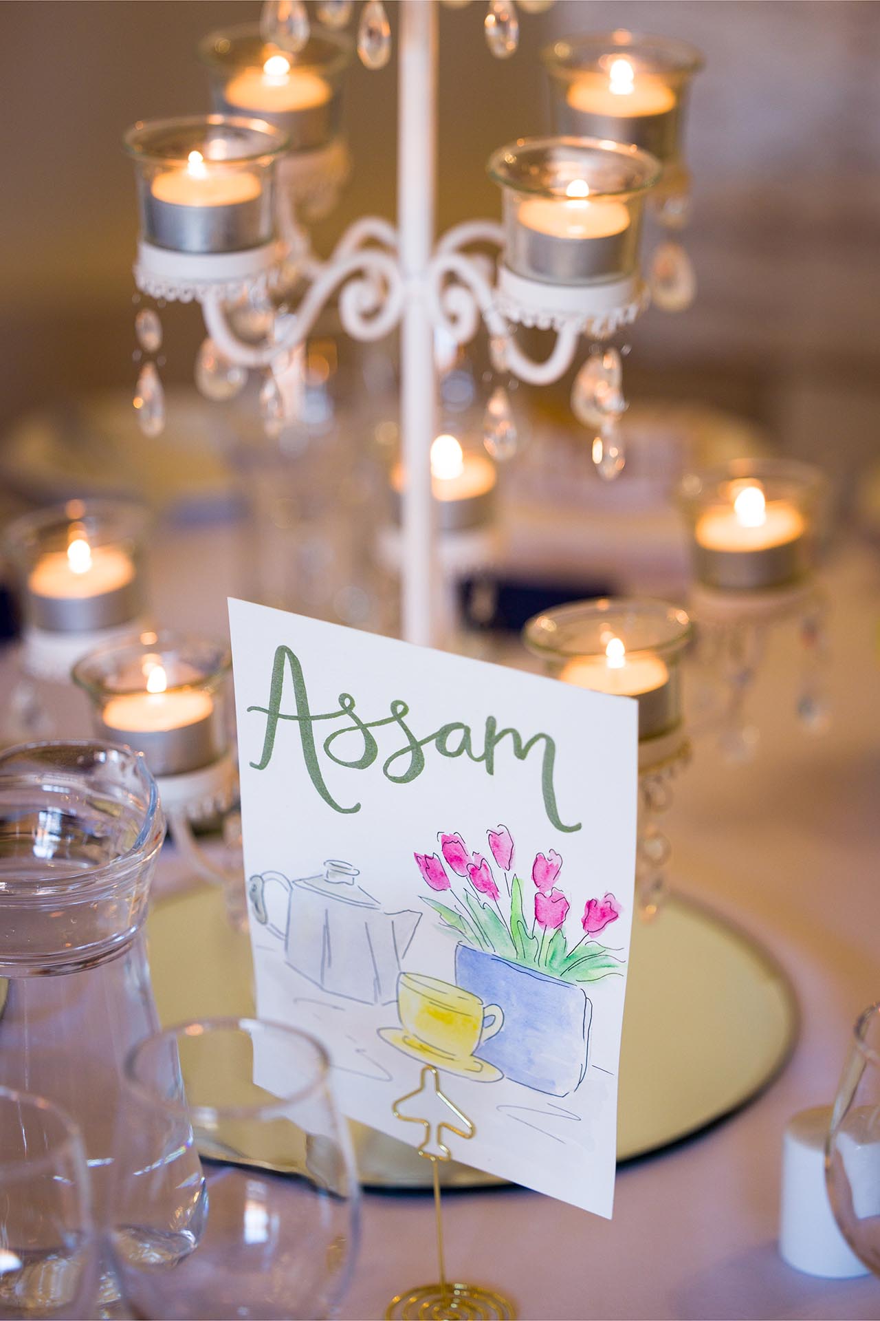 Table decorations for wedding breakfast at Leez Priory, Great Leighs, Chelmsford, by Essex wedding photographer