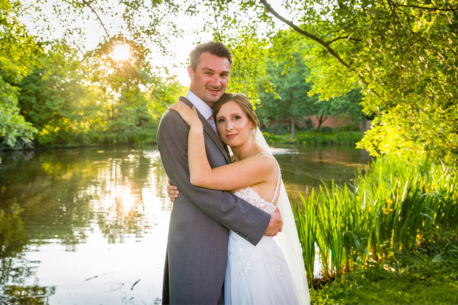Bride and groom golden light photograph at Leez Priory, Great Leighs, Chelmsford, Essex