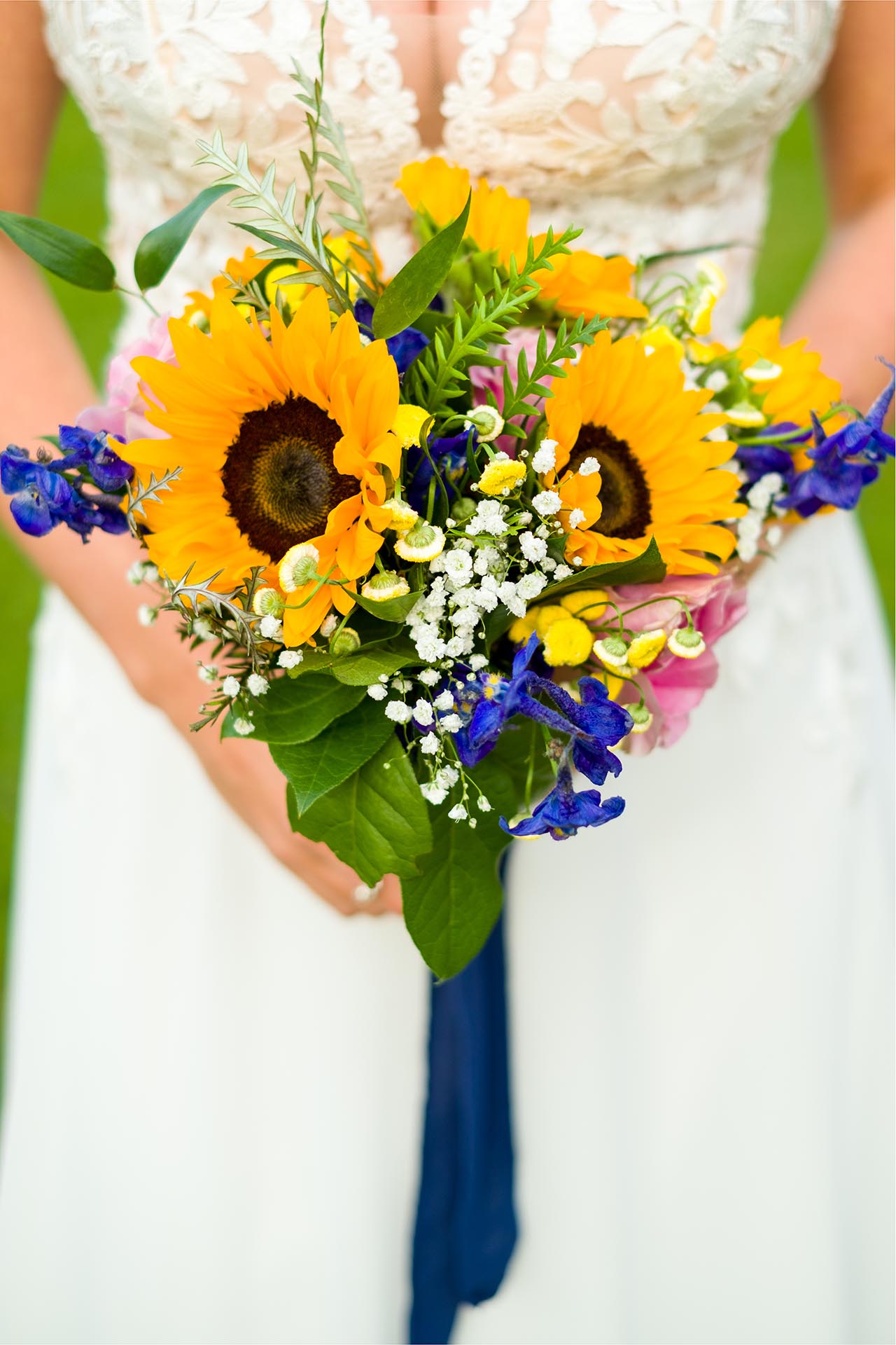 Summer bridal bouquet with sunflowers at a Leez Priory wedding, Great Leighs, Chelmsford, Essex
