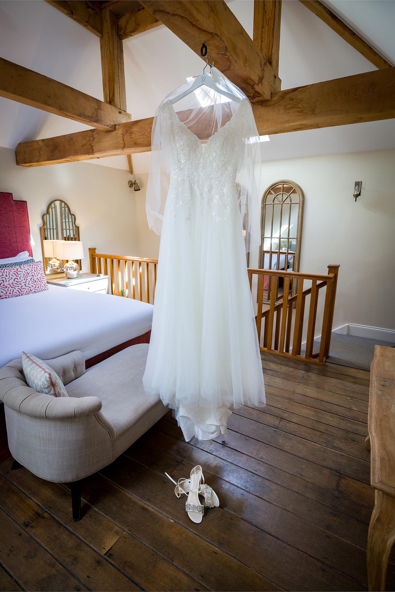 Photograph of the bride's dress and shoes at Apton Hall, Rochford, Essex