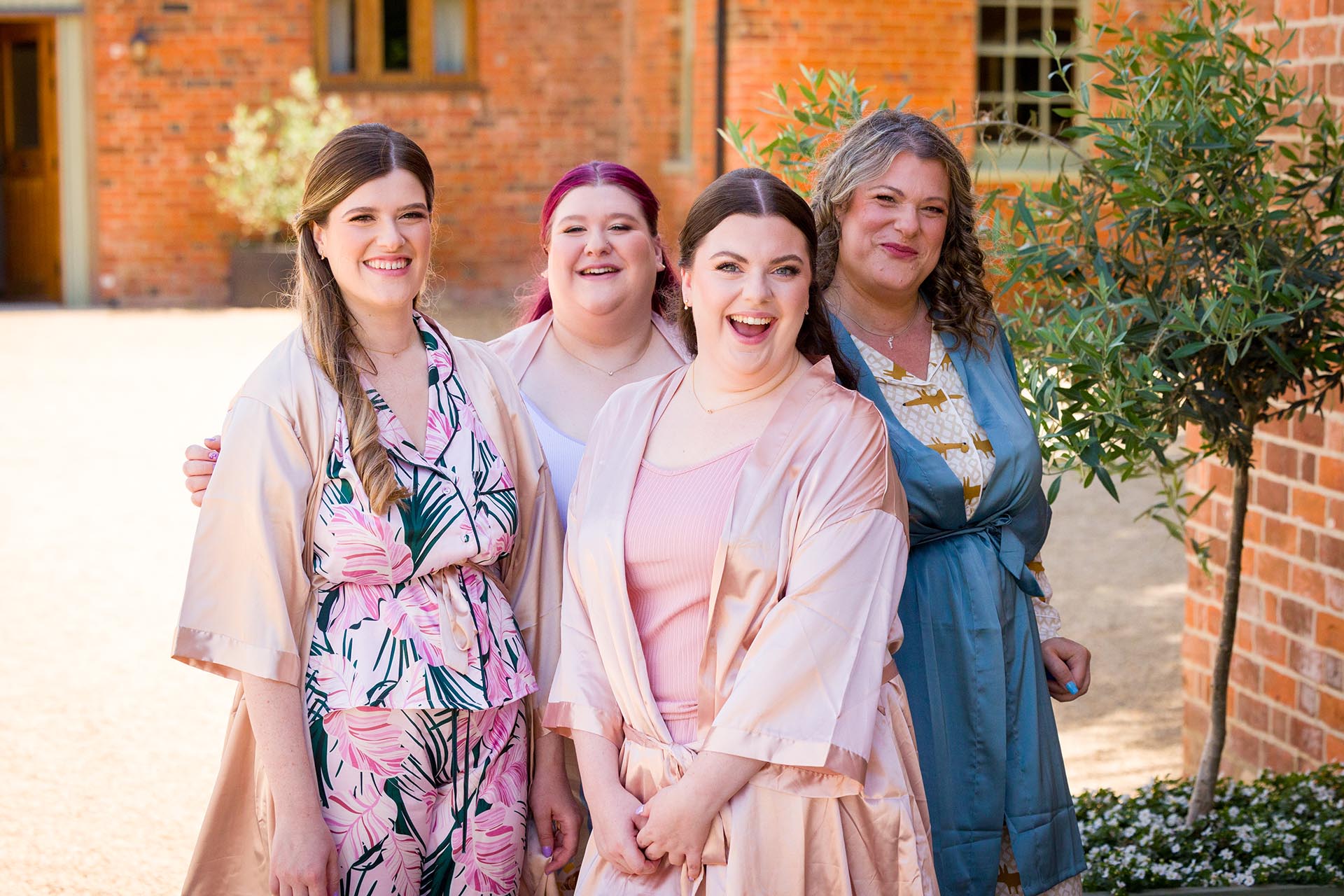 Photograph of the mother of the bride with bridesmaids at Apton Hall, Rochford, Essex