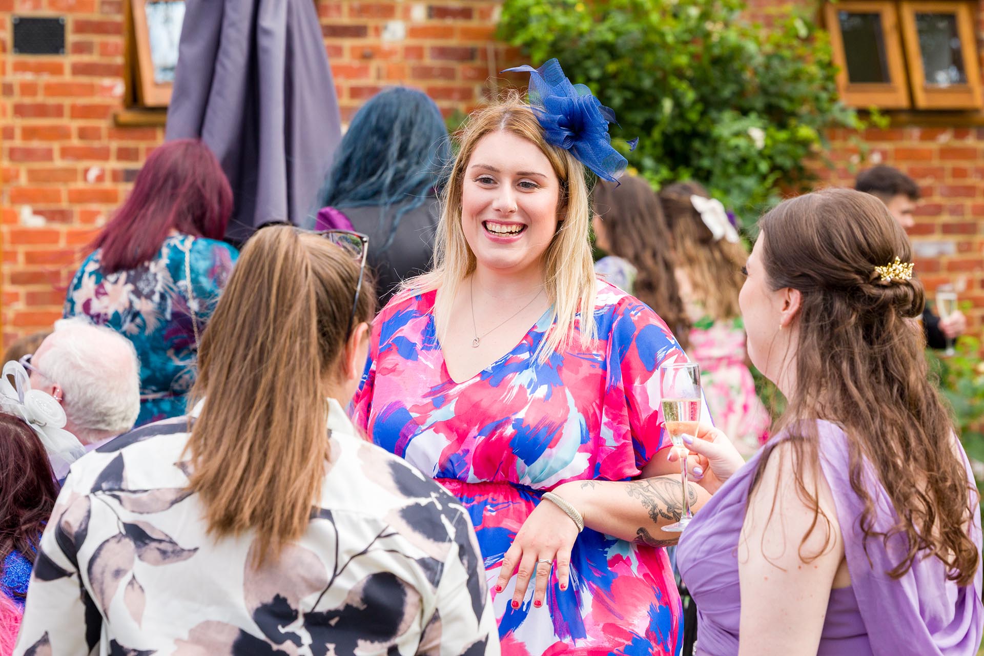 Candid photograph of wedding guests at Apton Hall, Rochford, Essex