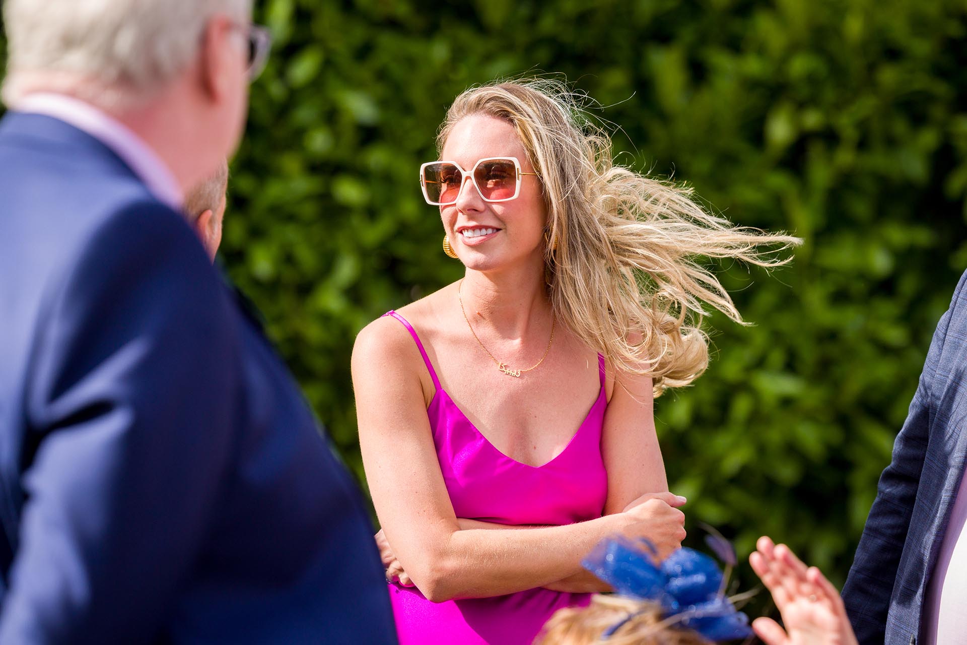 Candid photograph of a wedding guest at Apton Hall, Rochford, Essex