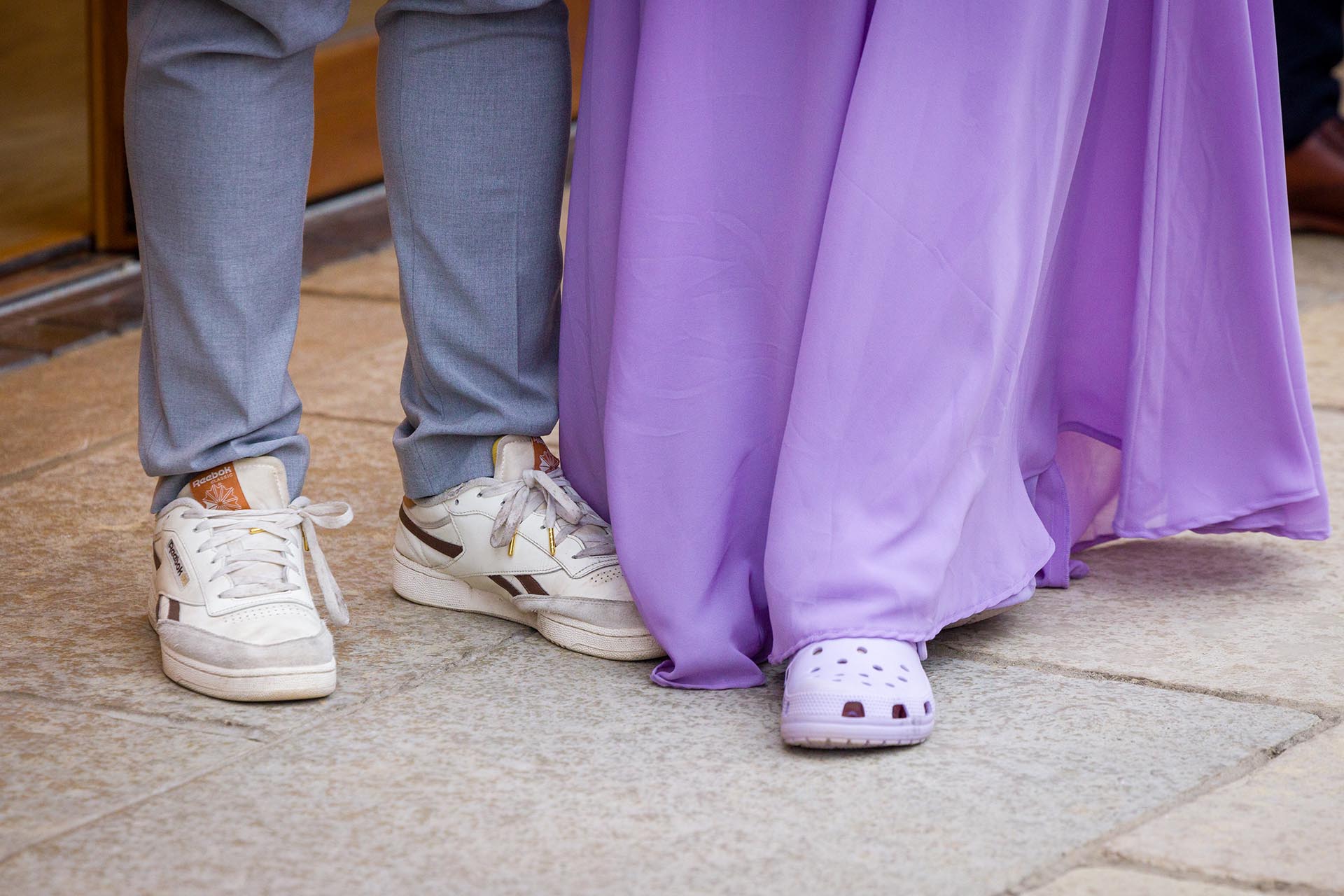Photograph of a gromsman and bridesmaid's feet wearing comfortable shoes at Apton Hall, Rochford, Essex