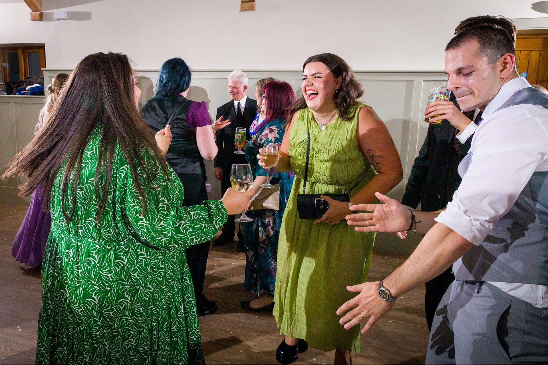 Colourful photograph of guests dancing at Apton Hall, Rochford, Essex