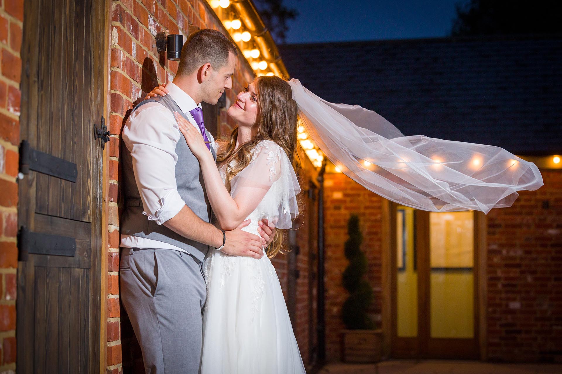 Twilight photograph of bride and groom at Apton Hall, Rochford, Essex.