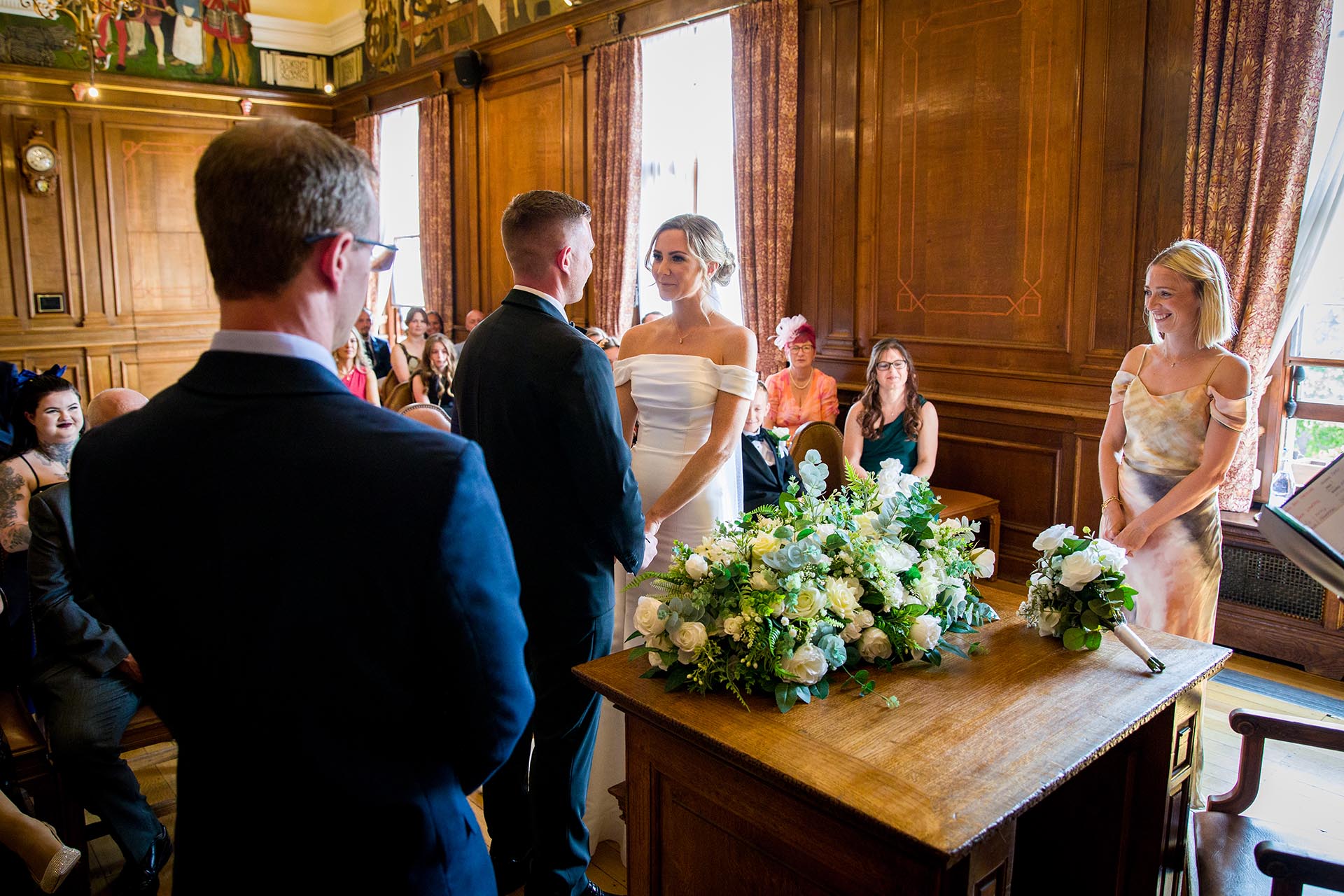Photograph of bride and groom during their wedding ceremony at Braintree Town Hall, Braintree, Essex