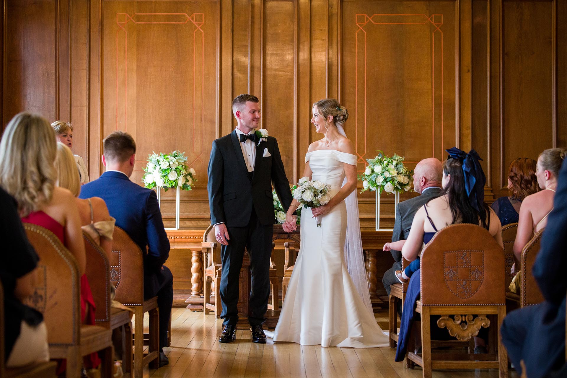 Photograph of bride and groom during their wedding ceremony at Braintree Town Hall, Braintree, Essex