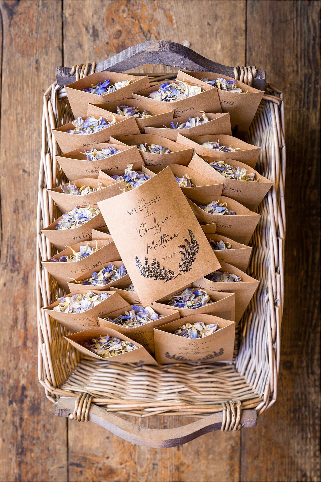 Photograph of natural flower petal confetti in brown paper packets