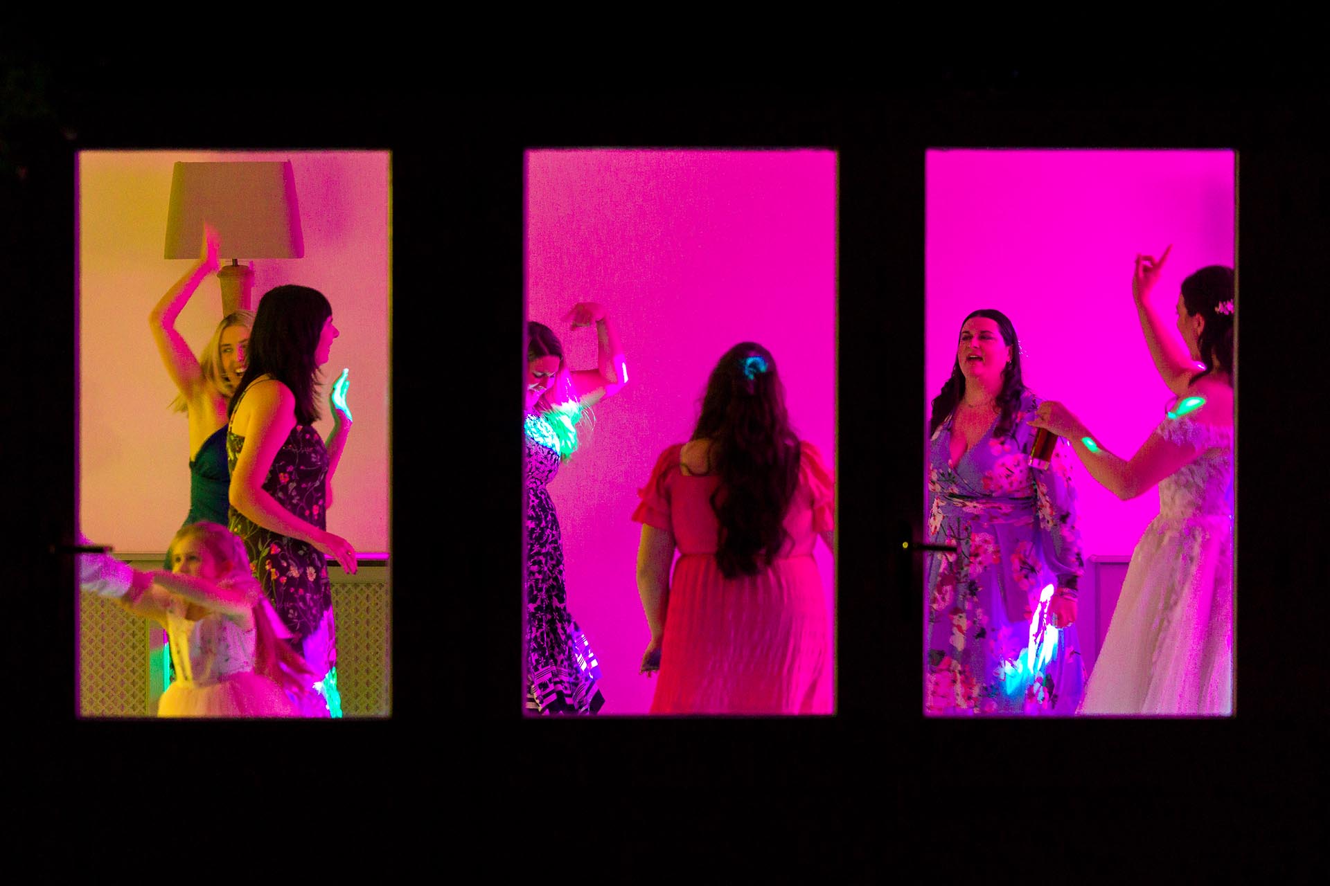 Photograph of wedding guests dancing at The Compasses at Pattiswick