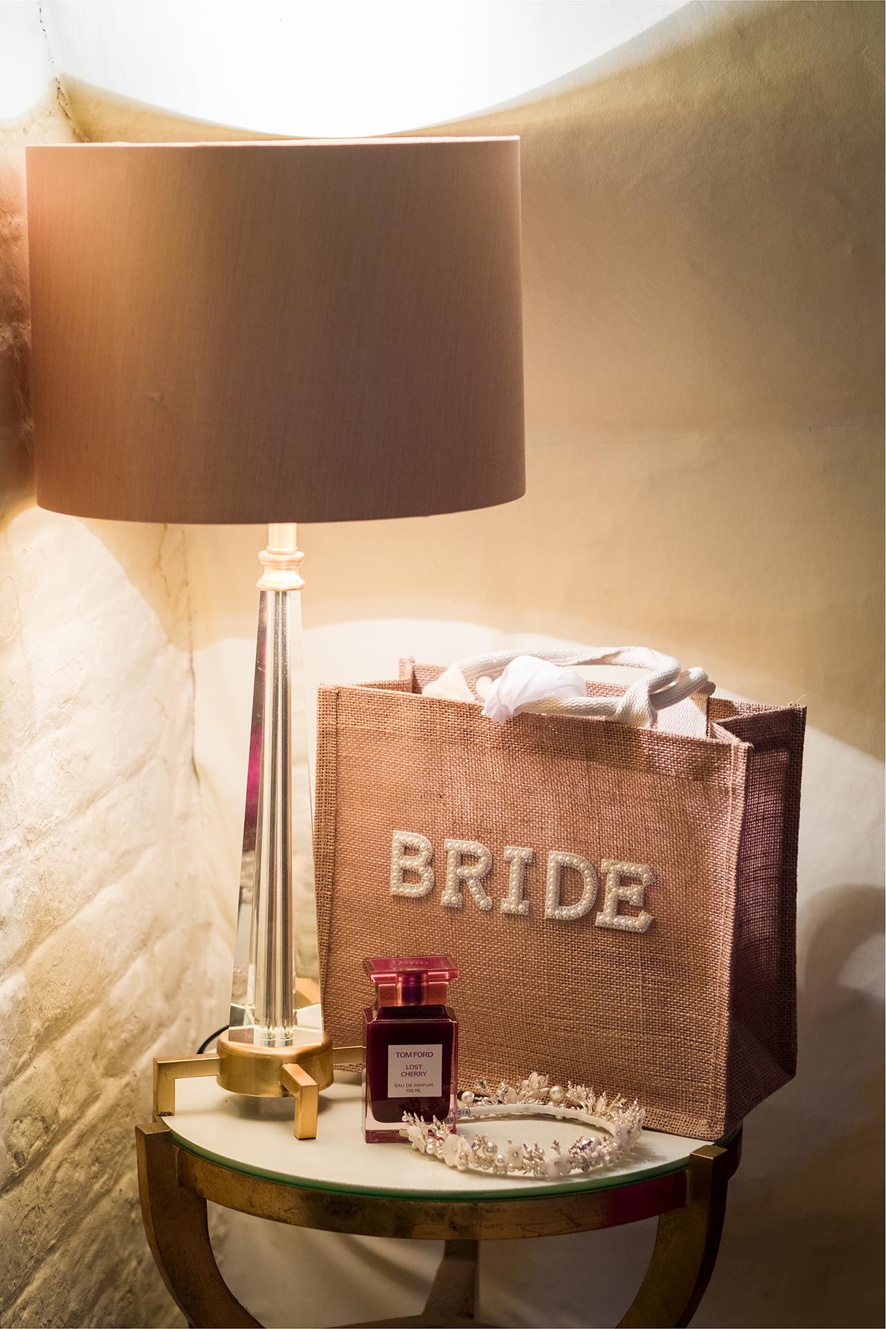 Photograph of bride's tote bag, tiara and perfume