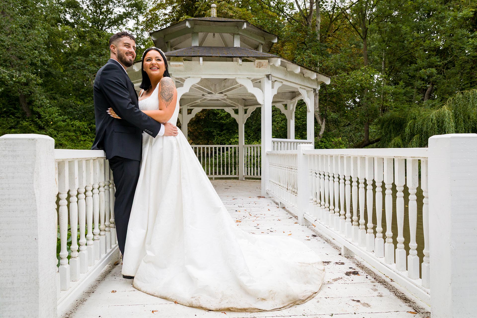 Photograph of bride and groom in the Lake Pavillion at Creeksea Place Manor, Burnham-on-Crouch, Essex