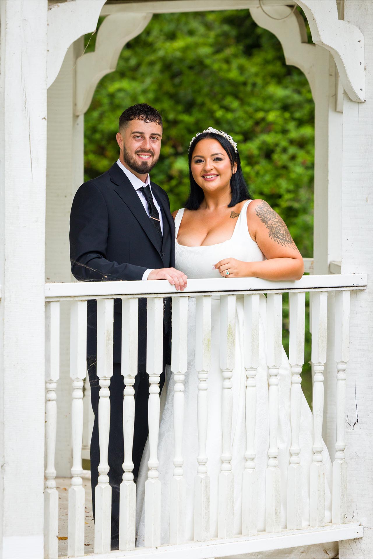 Photograph of bride and groom in the Lake Pavillion at Creeksea Place Manor, Burnham-on-Crouch, Essex
