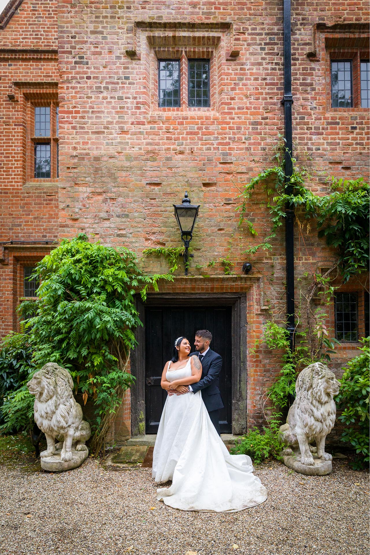 Photograph of bride and groom outside Creeksea Place Manor