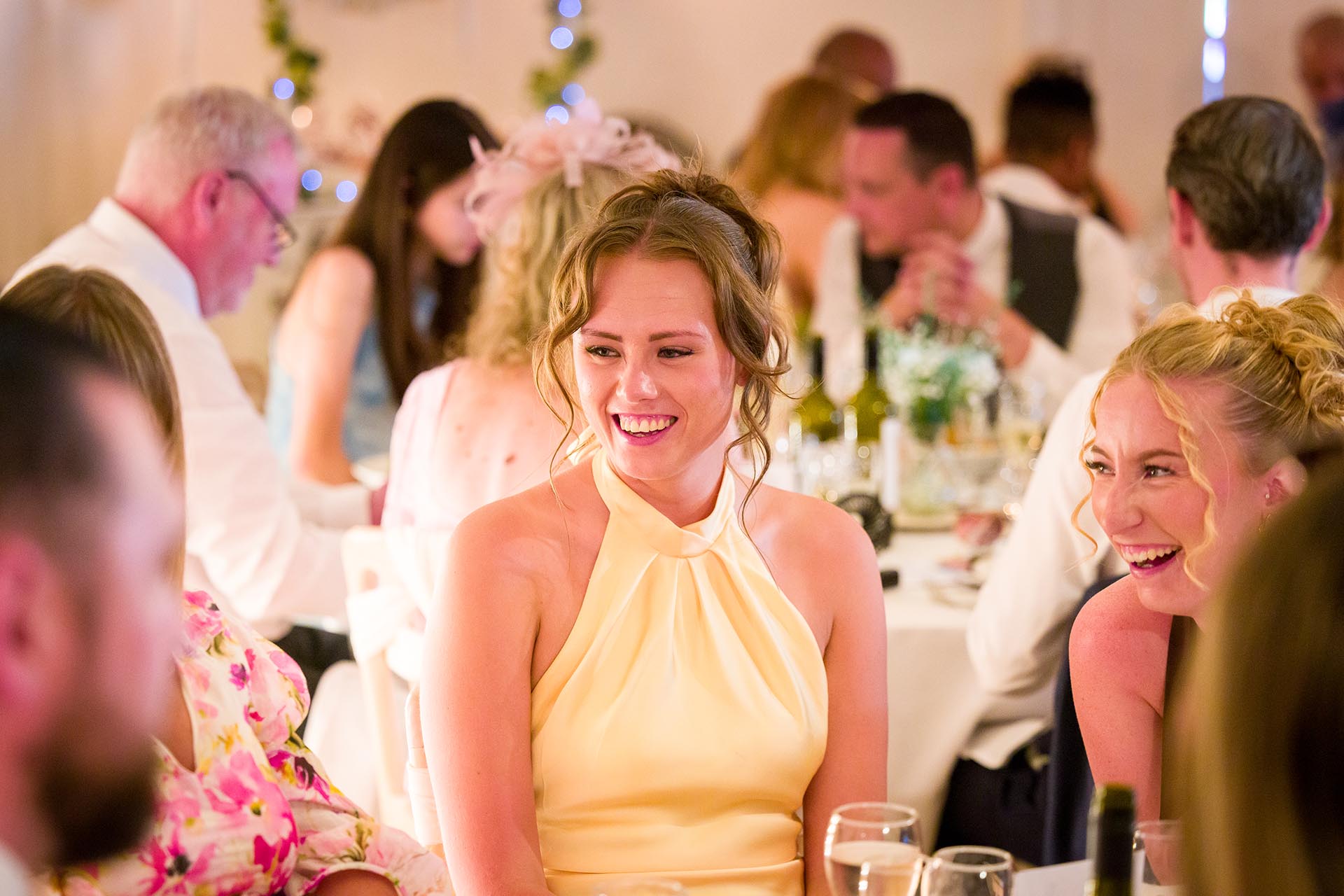 Wedding guests laughing