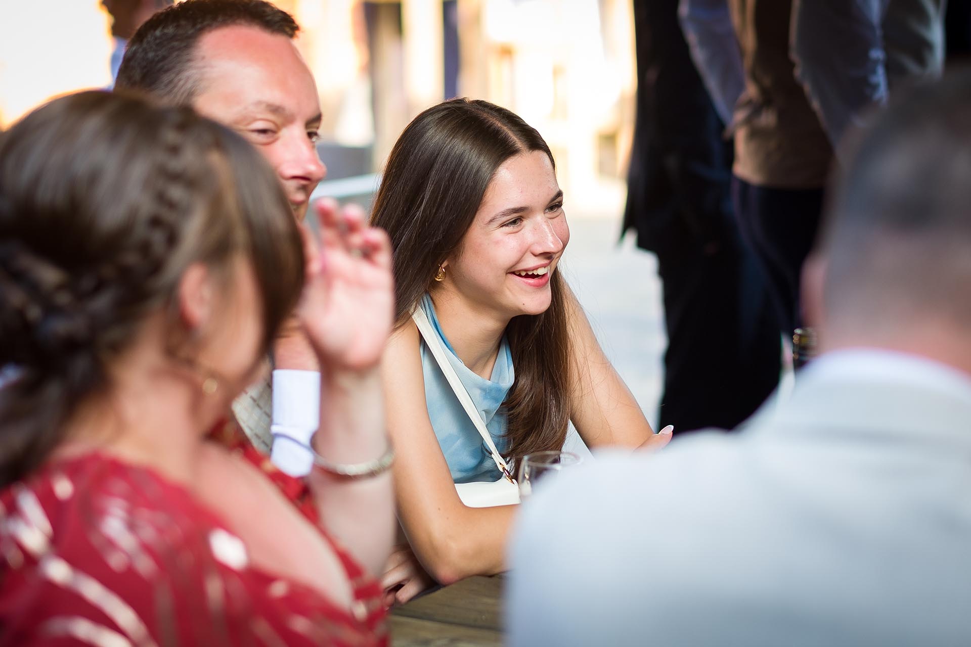 Wedding guests laughing